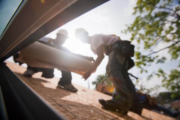 Roofers working